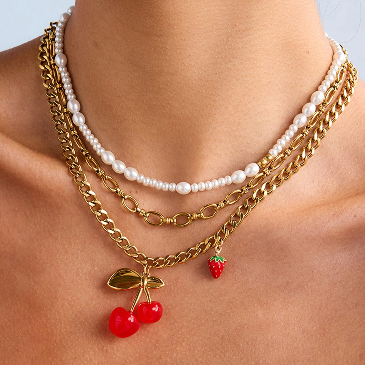 Collier ras de cou fantaisie doré – Modèles cerise, perle et chaîne