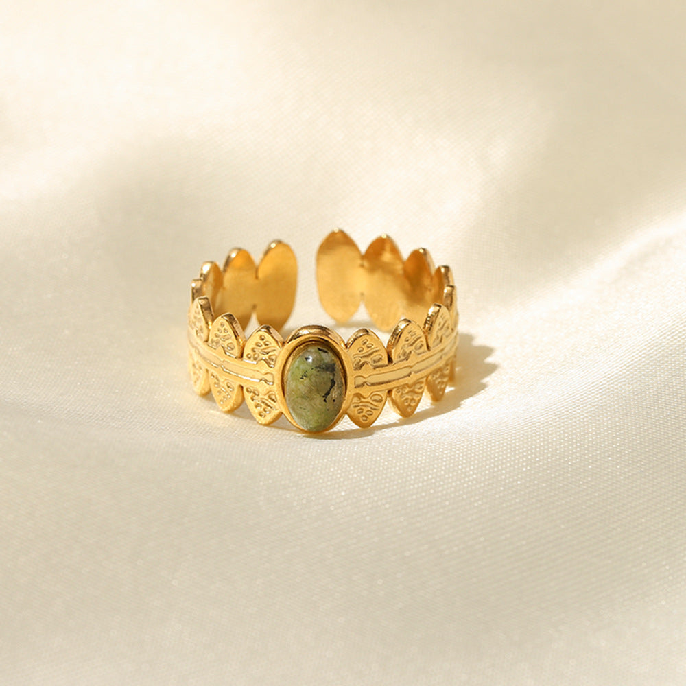 Bague torsadée avec pierre – Acier inoxydable doré