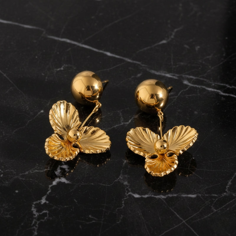 Boucle d'oreille fleur pendante