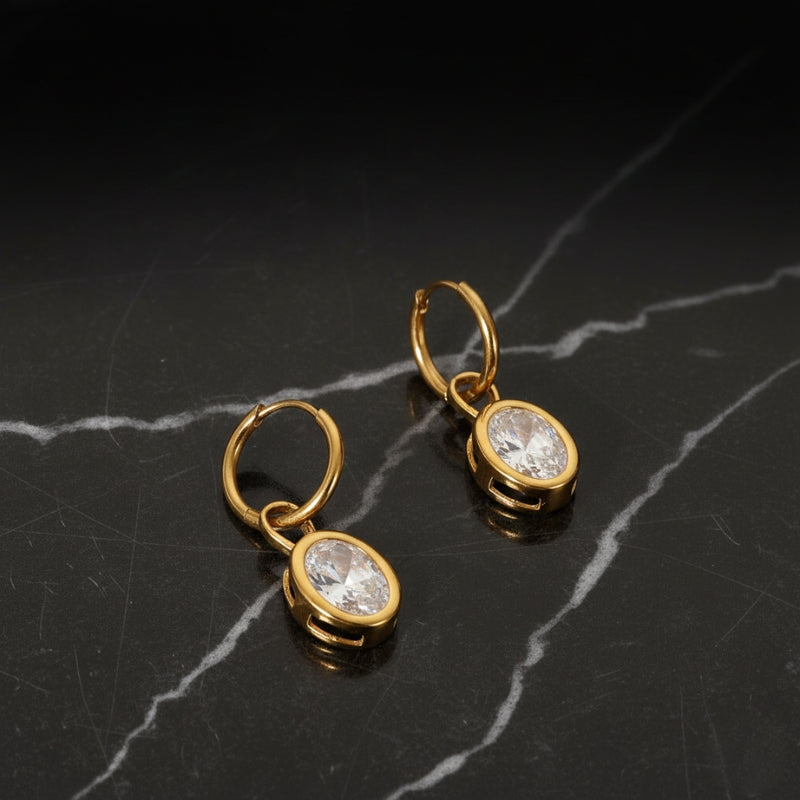 Boucles d'oreilles créoles avec pierre