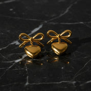 Boucles d’oreilles cœur nœud doré