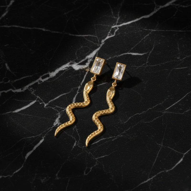 Boucles d’oreilles serpent pendantes en acier inoxydable