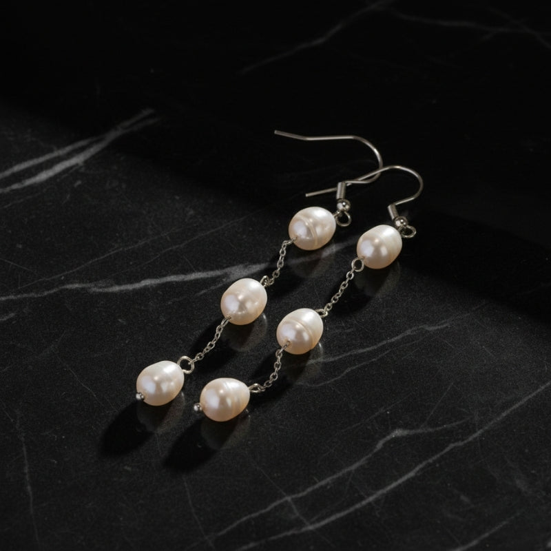 Boucles d’oreilles perle pendante en acier inoxydable