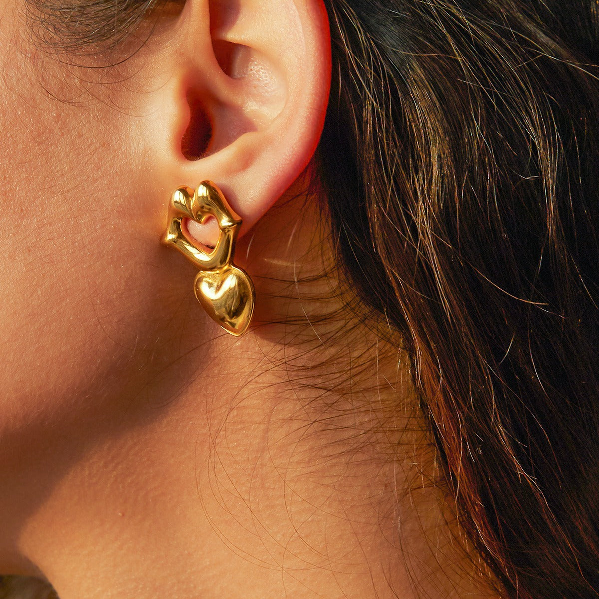 boucle d oreille guess coeur​