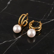 Boucles d'oreilles grosse perle blanche