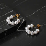 Boucles d'oreilles créoles blanches