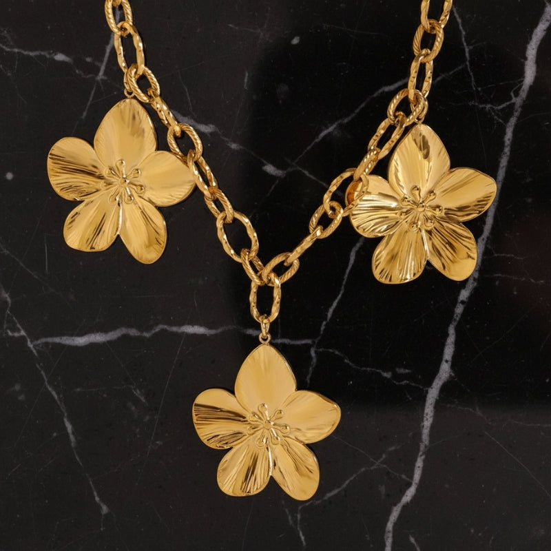 Collier fleur en acier inoxydable et or 18 K PVL