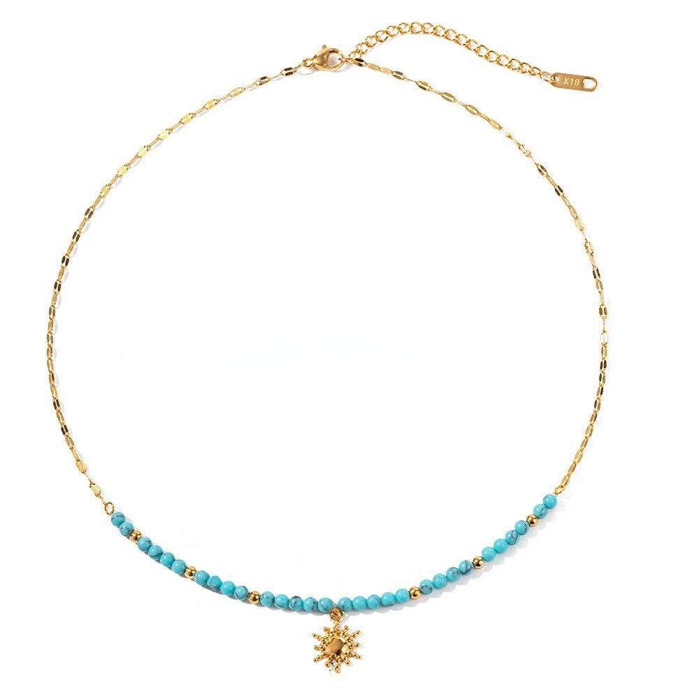collier breloque soleil
