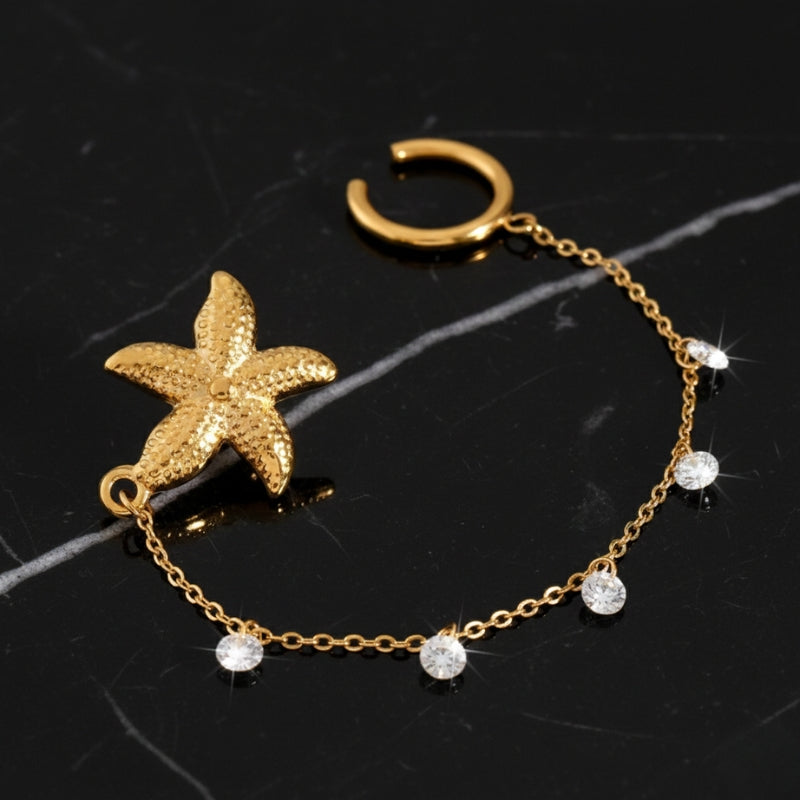 Mono boucle d’oreille étoile dorée avec strass en acier inoxydable