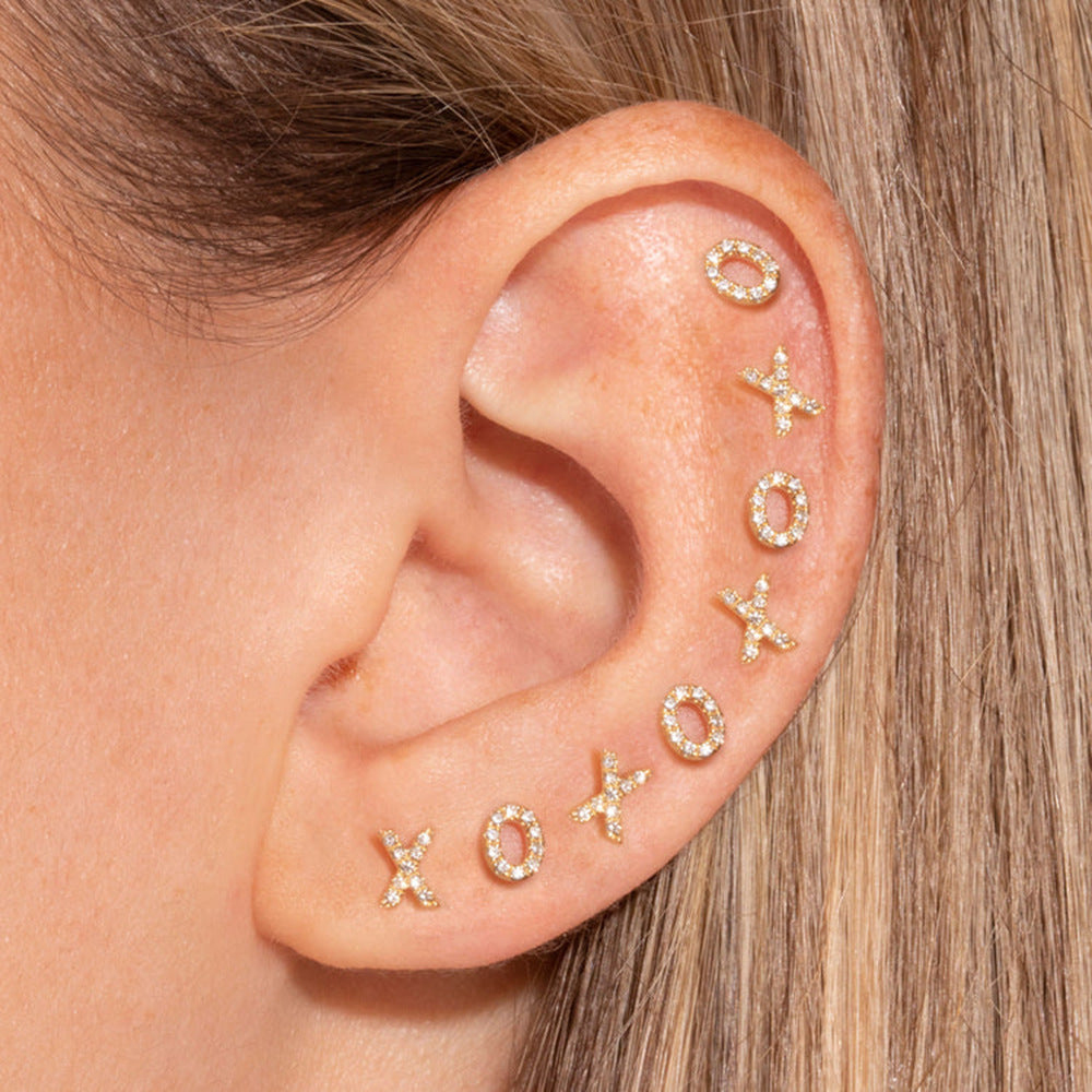 Boucles d’oreilles 2 trous – Acier inoxydable doré 18K pour look moderne

