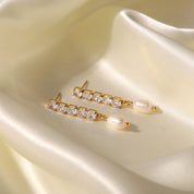 Boucles d’oreilles pendantes zirconium avec perle