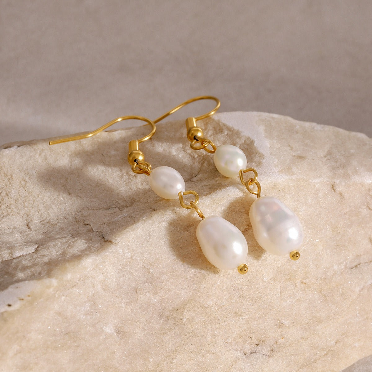 Boucles d'oreilles perle blanche pendante