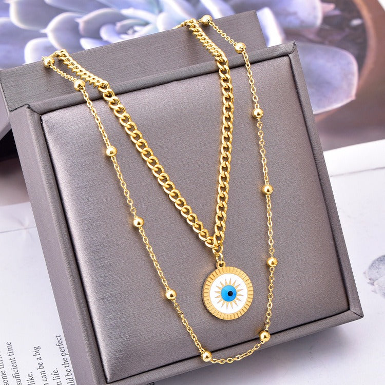 Collier double chaîne pendentif soleil – Acier inoxydable et plaquage or 18K pour femme