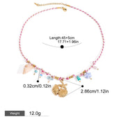 collier breloque coquillage