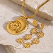 Parure coquillage escargot dorée femme