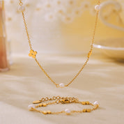 Parure perles fleurs dorées