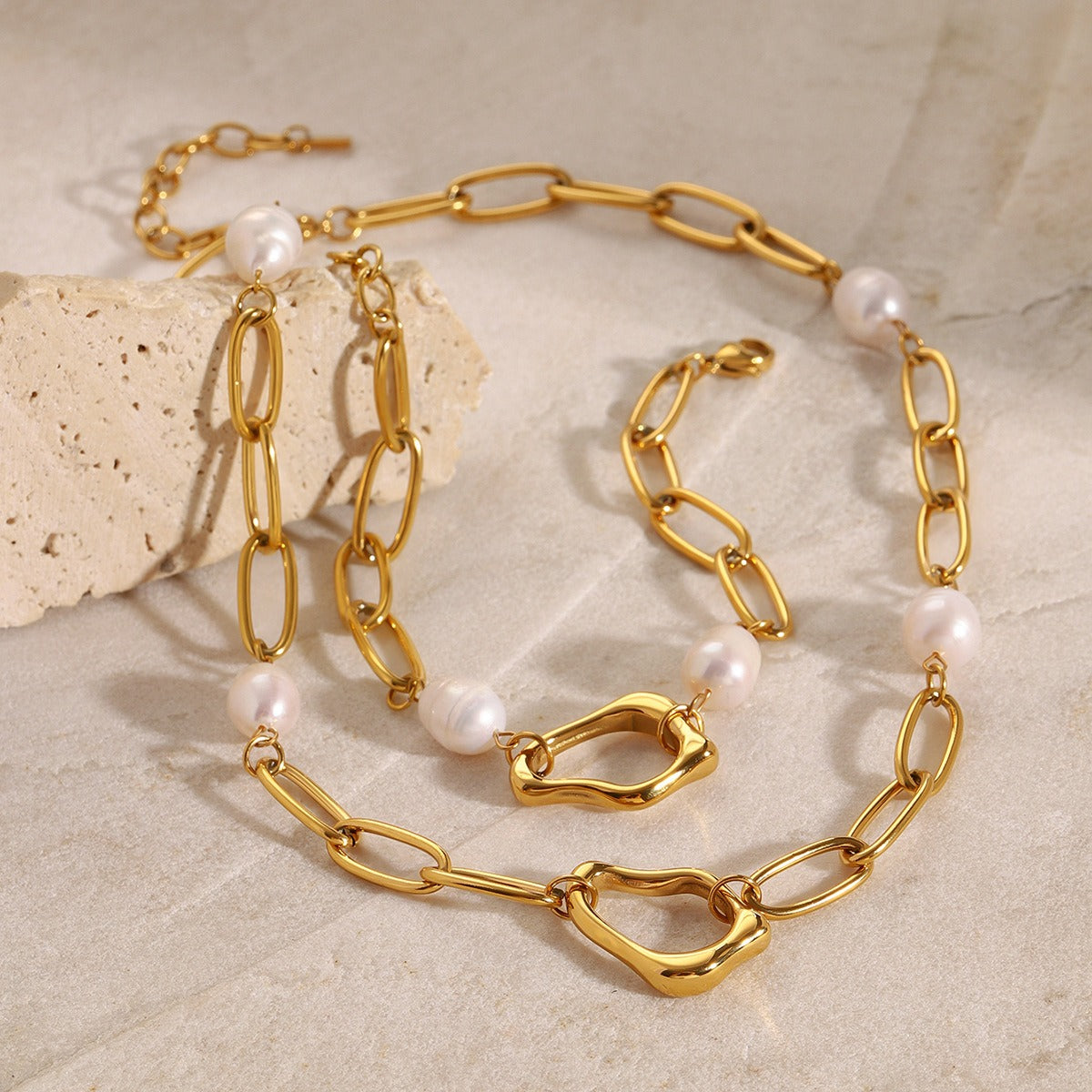 Parure perles maillons creux