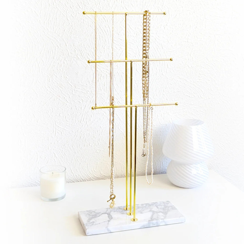 Porte colliers or et marbre, collier porte bonheur