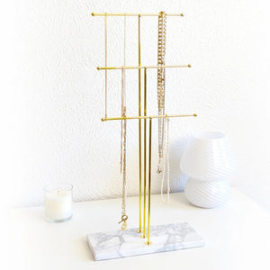 Porte colliers or et marbre